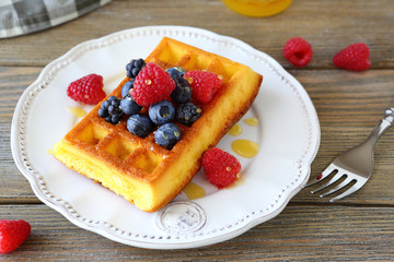 soft waffles with berries for breakfast