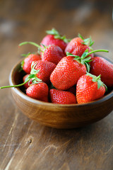 strawberries in a wooden bowl