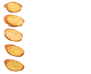Homemade garlic bread of French baguette over white background