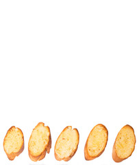 Homemade garlic bread of French baguette over white background
