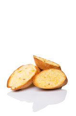Homemade garlic bread of French baguette over white background