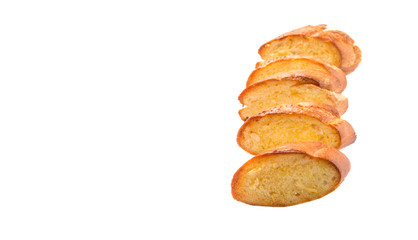 Homemade garlic bread of French baguette over white background