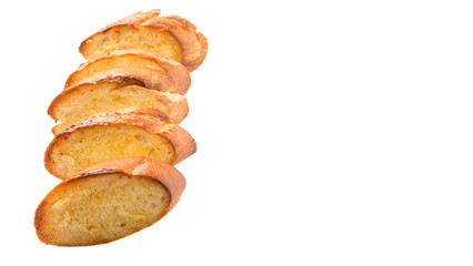 Homemade garlic bread of French baguette over white background