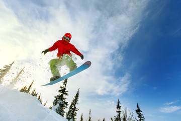 Snowboarder jumping