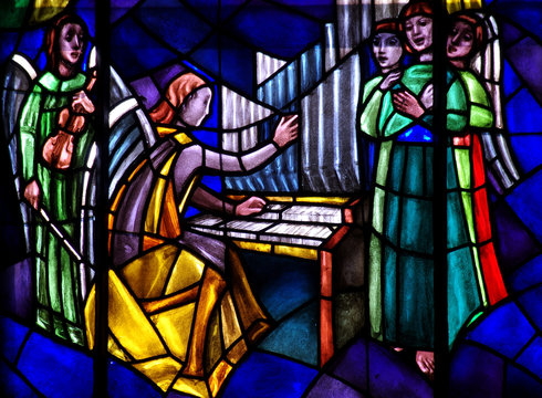 Angels: singing and making music in stained glass