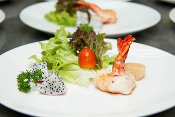 shrimp prawns with fresh lettuce in plate