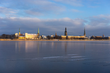 Fototapeta premium Panorama of Riga on the frozen river and fresh snow