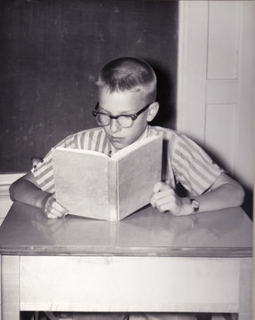 Vintage Photo Of Young Boy Reading Book