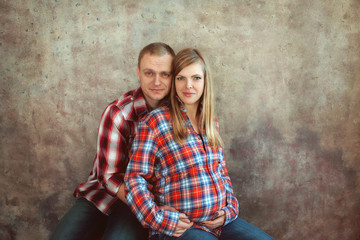 pregnant woman with her husband