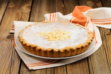 Banana tart on wooden background