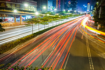 Fototapeta na wymiar city road at night on rush hour traffic