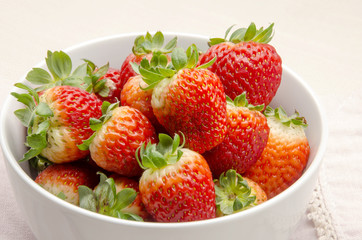 Several fresh strawberries