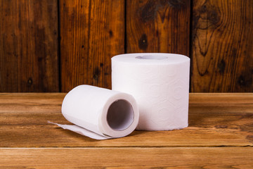 Toilet paper on a wooden table
