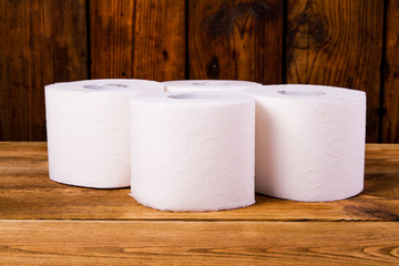 Toilet paper on a wooden table