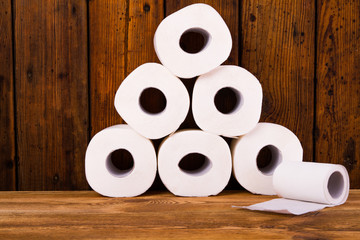 Toilet paper on a wooden table