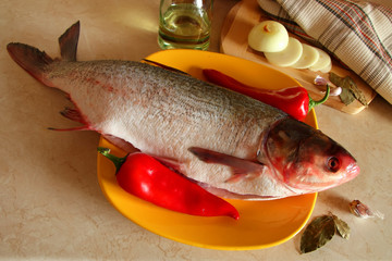 Gutted carp on a platter.