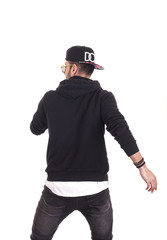 Back of guy dancing wearing hoodie and black cap