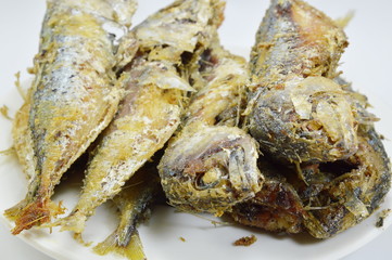 fried mackerels on the dish