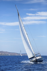 Sailing, racing yachts on the high seas. Luxury yachts.