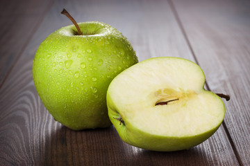 fresh green apples on the table