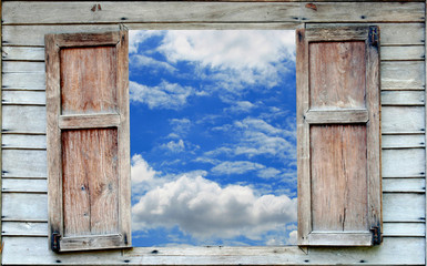Fototapety  błękitne niebo i stare drewniane okno