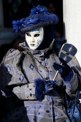 Fototapeta na wymiar Black and blue mask at the Carnival of Venice