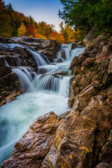 Autumn color and waterfall at Rocky Gorge, on the Kancamagus Hig