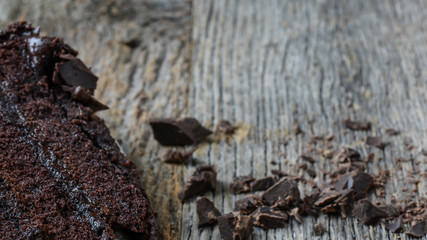 Chocolate Chunk Cake on Wood Background