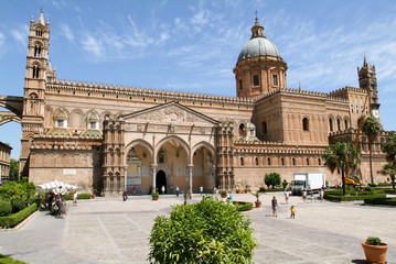 People walking in front of the cathedral at Noto