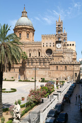 Naklejka premium People walking in front of the cathedral at Palermo