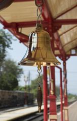 Brass bell highly polished on a Thai railroad station