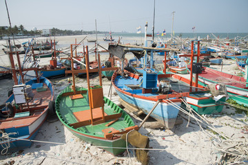 Fishing boats on the beach at Hua Hin Thailand