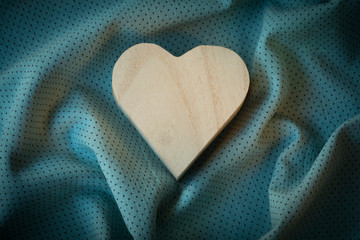 heart  wooden box on cloth fabric background