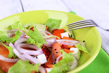 Fresh fish salad with vegetables