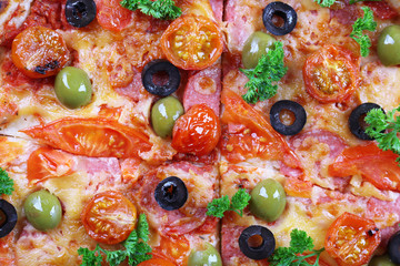 Tasty pizza with sausage and vegetables, macro view