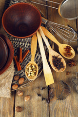 Retro kitchen utensils for baking on rustic wooden background