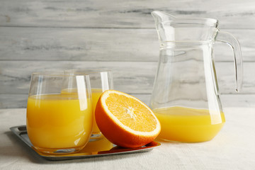 Glass of orange juice with slices