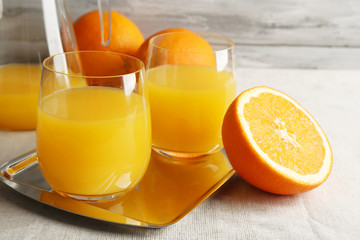 Glass of orange juice with slices