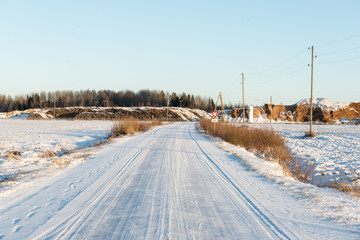 Fototapeta premium country snowy road in winter