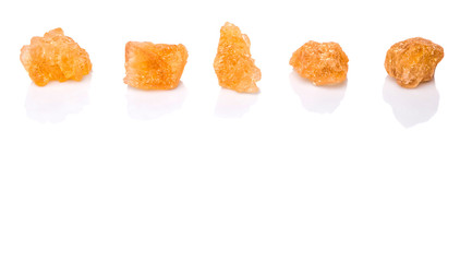 Sugarcane rock over white background 