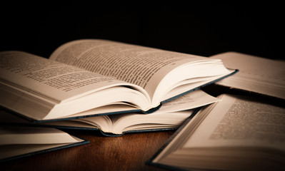 stack of open books