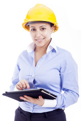 Female engineer holding a tablet computer, isolated on white bac