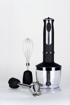 Manual blender with attachments. Kitchen electric equipment.