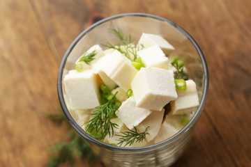 Feta cheese on table