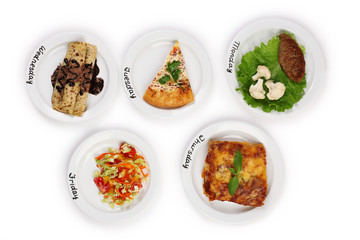 Daily menu. Plates with food on table