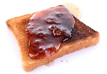 Toasted bread with jam isolated on white background