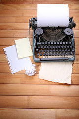 Antique Typewriter. Vintage Typewriter Machine on wooden table