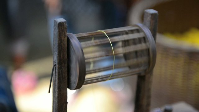 draw the silk from cocoons boiling