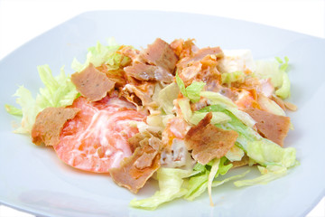 Turkish kebab salad with vegetables on white background