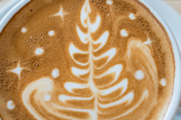 Cappuccino or latte coffee with tree shape